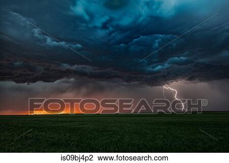 Asperatus clouds in sunset and cloud-to-ground lightning bolt, Ogallala, Nebraska, US View Large Photo Image Stock Image - Asperatus clouds in sunset and cloud-to-ground lightning bolt, Ogallala, Nebraska, US. Fotosearch