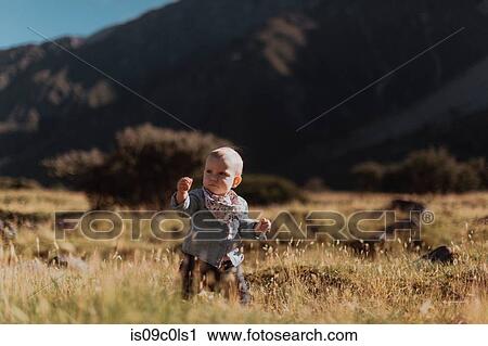 Baby exploring wilderness, Wanaka, Taranaki, New Zealand View Large Photo Image Stock Image - Baby exploring wilderness, Wanaka, Taranaki, New Zealand. Fotosearch