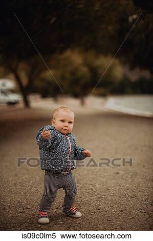 Baby walking on beach View Large Photo Image Stock Photography - Baby walking on beach. Fotosearch