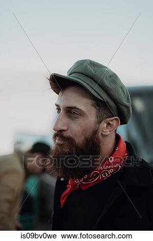 Bearded man in cap and neckerchief View Large Photo Image Stock Image - Bearded man in cap and neckerchief. Fotosearch