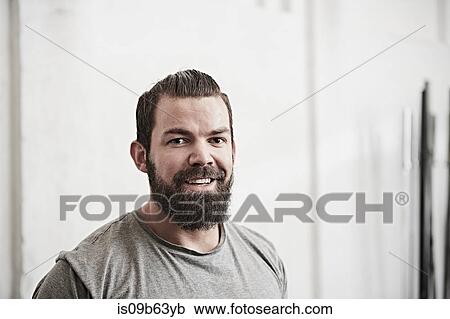 Stock Image - Bearded young man. Fotosearch
