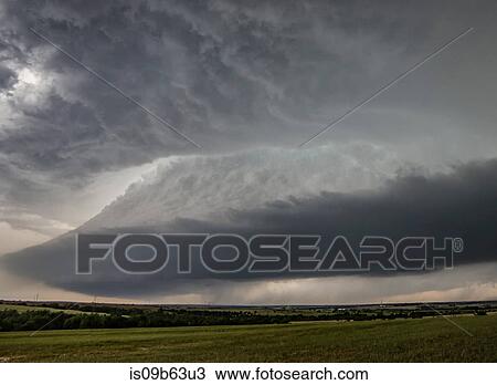 Bell shaped updraft of rotating supercell over rural area, Chester, Oklahoma, United States, North America View Large Photo Image Stock Image - Bell shaped updraft of rotating supercell over rural area, Chester, Oklahoma, United States, North America. Fotosearch