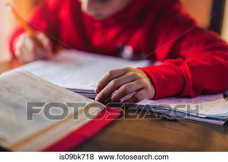 Boy doing homework View Large Photo Image Stock Photo - Boy doing homework. Fotosearch