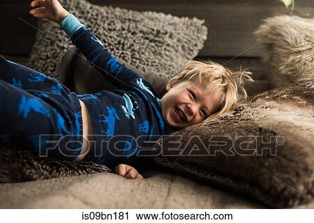 Boy playing on floor View Large Photo Image Stock Image - Boy playing on floor. Fotosearch