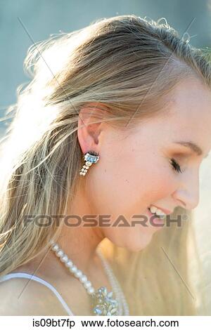 Bride with sunlight on hair View Large Photo Image Stock Photography - Bride with sunlight on hair. Fotosearch