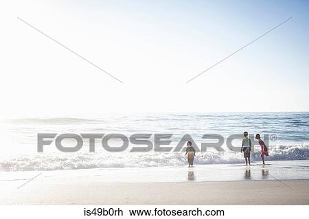 Brothers and sister on beach, Cape Town, South Africa View Large Photo Image Stock Image - Brothers and sister on beach, Cape Town, South Africa. Fotosearch