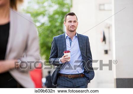 Picture - Businessman on coffee break. Fotosearch