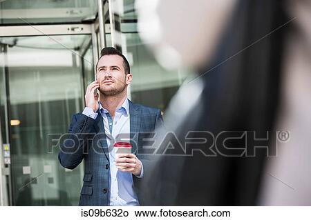Picture - Businessman on coffee break. Fotosearch