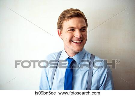 Businessman wearing braces and tie View Large Photo Image Stock Image - Businessman wearing braces and tie. Fotosearch