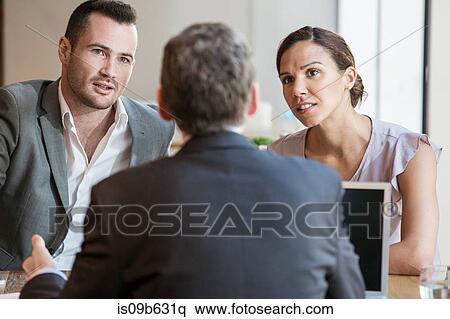 Businessmen and businesswoman working View Large Photo Image Stock Photography - Businessmen and businesswoman working. Fotosearch