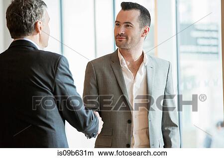 Businessmen shaking hands View Large Photo Image Picture - Businessmen shaking hands. Fotosearch