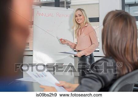 Stock Photo - Businesswomen at meeting in office. Fotosearch