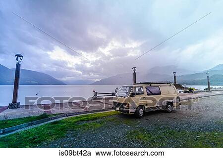 Stock Image - Camper van by sea, Chile. Fotosearch