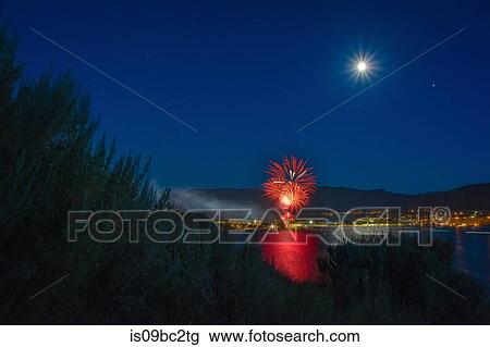 Canada Day celebration over Okanagan Lake, full moon in sky, Penticton, British Columbia, Canada View Large Photo Image Stock Image - Canada Day celebration over Okanagan Lake, full moon in sky, Penticton, British Columbia, Canada. Fotosearch