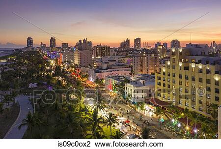 Cityscape with skyscraper skyline at dusk, aerial view, Miami Beach, Florida, United States View Large Photo Image Stock Image - Cityscape with skyscraper skyline at dusk, aerial view, Miami Beach, Florida, United States. Fotosearch