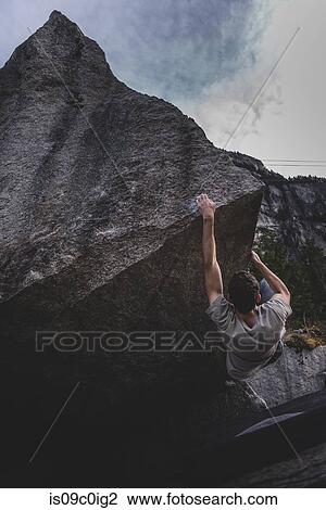 Climber bouldering in forest, Squamish, Canada View Large Photo Image Stock Image - Climber bouldering in forest, Squamish, Canada. Fotosearch