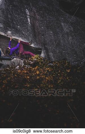 Climber bouldering in forest, Squamish, Canada View Large Photo Image Stock Photo - Climber bouldering in forest, Squamish, Canada. Fotosearch