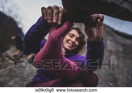 Climber putting on shoes, Squamish, Canada View Large Photo Image Stock Photo - Climber putting on shoes, Squamish, Canada. Fotosearch