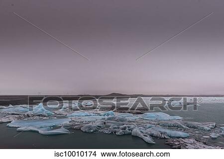 Picture - Coastal seascape with icebergs, Jokulsarlon, Iceland. Fotosearch