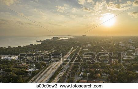 Coastline and highway at sunset, aerial view, Miami, Florida, United States View Large Photo Image Stock Image - Coastline and highway at sunset, aerial view, Miami, Florida, United States. Fotosearch