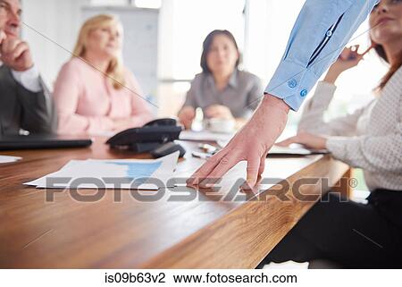 Colleagues having discussion in business meeting View Large Photo Image Stock Image - Colleagues having discussion in business meeting. Fotosearch
