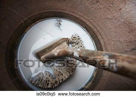 Construction site paint pot and brush, overhead close up View Large Photo Image Stock Photography - Construction site paint pot and brush, overhead close up. Fotosearch