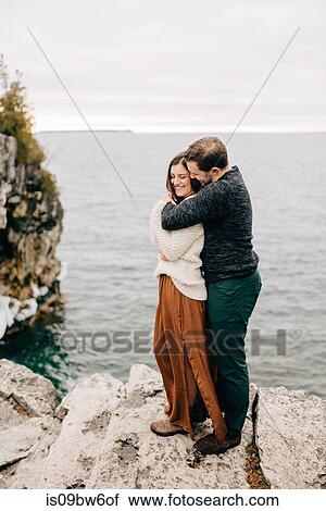 Couple by seaside, Tobermory, Canada View Large Photo Image Stock Image - Couple by seaside, Tobermory, Canada. Fotosearch