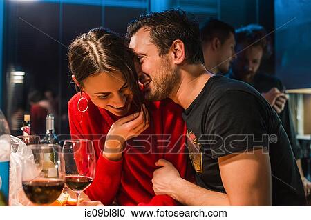 Couple drinking wine at party in apartment View Large Photo Image Stock Image - Couple drinking wine at party in apartment. Fotosearch