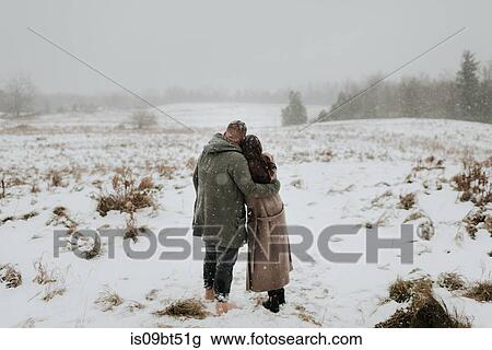 Couple enjoying snowy landscape, Georgetown, Canada View Large Photo Image Stock Image - Couple enjoying snowy landscape, Georgetown, Canada. Fotosearch