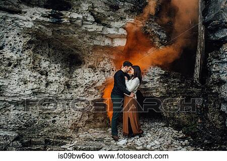 Couple hugging beside rock face, Tobermory, Canada View Large Photo Image Picture - Couple hugging beside rock face, Tobermory, Canada. Fotosearch