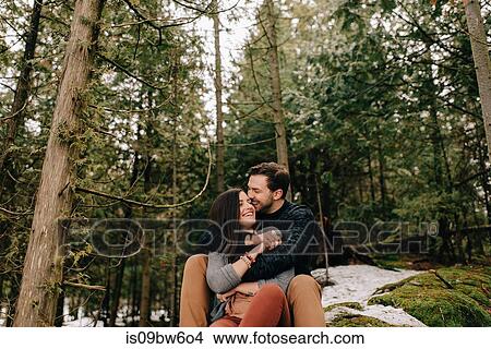 Couple hugging in forest, Tobermory, Canada View Large Photo Image Picture - Couple hugging in forest, Tobermory, Canada. Fotosearch
