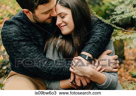 Couple hugging in forest, Tobermory, Canada View Large Photo Image Stock Image - Couple hugging in forest, Tobermory, Canada. Fotosearch