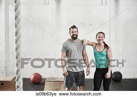Couple in cross training gym View Large Photo Image Stock Image - Couple in cross training gym. Fotosearch