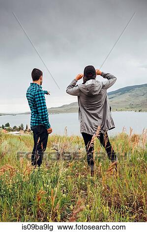Couple near Dillon Reservoir, looking at view, Silverthorne, Colorado, USA View Large Photo Image Stock Image - Couple near Dillon Reservoir, looking at view, Silverthorne, Colorado, USA. Fotosearch