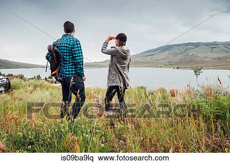 Couple near Dillon Reservoir, looking at view, Silverthorne, Colorado, USA View Large Photo Image Stock Photography - Couple near Dillon Reservoir, looking at view, Silverthorne, Colorado, USA. Fotosearch
