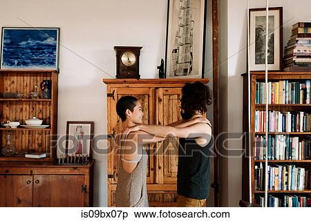 Couple playing at home View Large Photo Image Stock Photography - Couple playing at home. Fotosearch