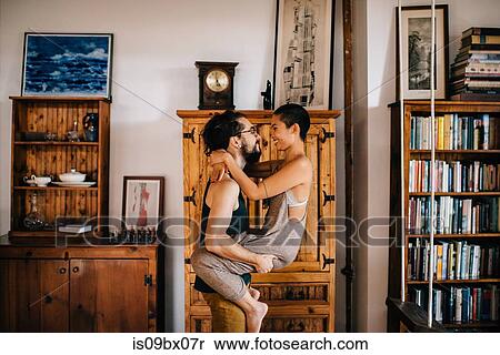 Couple playing at home View Large Photo Image Stock Photography - Couple playing at home. Fotosearch
