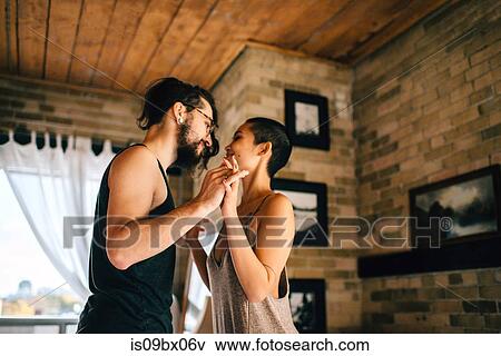 Couple slow dancing at home View Large Photo Image Stock Photo - Couple slow dancing at home. Fotosearch