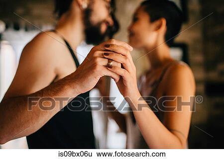 Couple slow dancing at home View Large Photo Image Stock Photograph - Couple slow dancing at home. Fotosearch