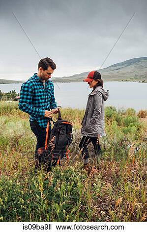 Couple standing beside Dillon Reservoir, Silverthorne, Colorado, USA View Large Photo Image Stock Image - Couple standing beside Dillon Reservoir, Silverthorne, Colorado, USA. Fotosearch