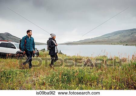 Couple walking beside Dillon Reservoir, Silverthorne, Colorado, USA View Large Photo Image Stock Image - Couple walking beside Dillon Reservoir, Silverthorne, Colorado, USA. Fotosearch