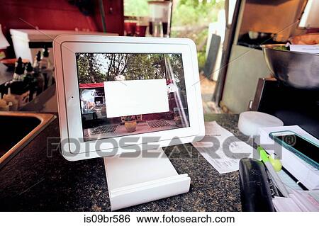 Digital screen for food orders and payment at eatery View Large Photo Image Stock Photograph - Digital screen for food orders and payment at eatery. Fotosearch