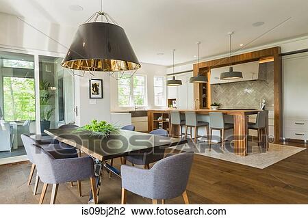 Dining room and kitchen area inside a luxurious contemporary home View Large Photo Image Stock Image - Dining room and kitchen area inside a luxurious contemporary home. Fotosearch