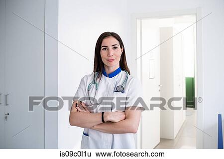 Doctor in consultation room View Large Photo Image Stock Photograph - Doctor in consultation room. Fotosearch