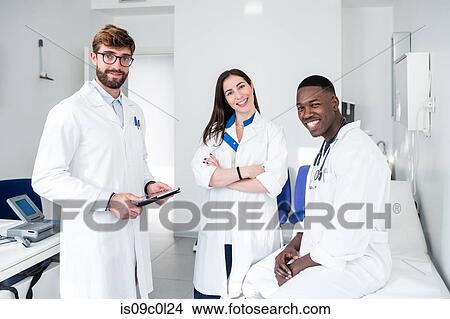 Doctors in consultation room View Large Photo Image Picture - Doctors in consultation room. Fotosearch