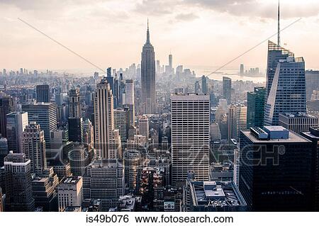 Elevated cityscape view with skyscrapers and the Empire State Building, New York City, USA View Large Photo Image Stock Photograph - Elevated cityscape view with skyscrapers and the Empire State Building, New York City, USA. Fotosearch