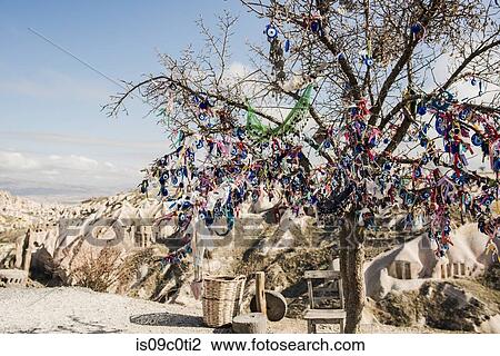 Evil eye tree, Pigeon Valley, Greme, Cappadocia, Turkey View Large Photo Image Stock Image - Evil eye tree, Pigeon Valley, Greme, Cappadocia, Turkey. Fotosearch