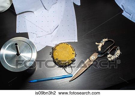 Fabric, pin cushion, pair of scissors and other tailor's tools View Large Photo Image Stock Image - Fabric, pin cushion, pair of scissors and other tailor's tools. Fotosearch