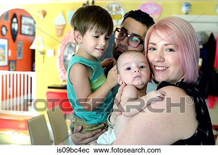 Stock Image - Family at home. Fotosearch