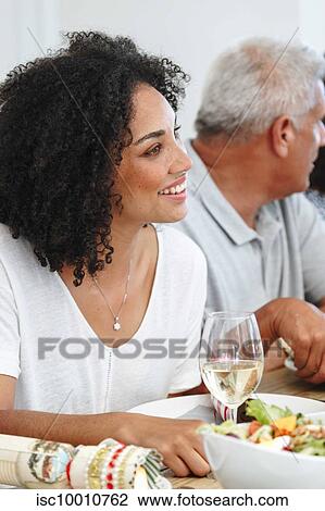 Family talking and bonding at home party View Large Photo Image Stock Image - Family talking and bonding at home party. Fotosearch